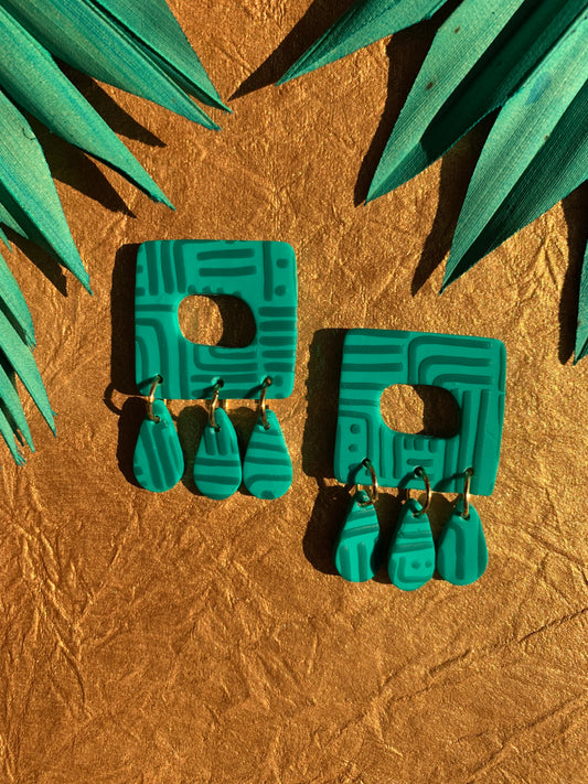 Pathways in Teal: Square Dangles