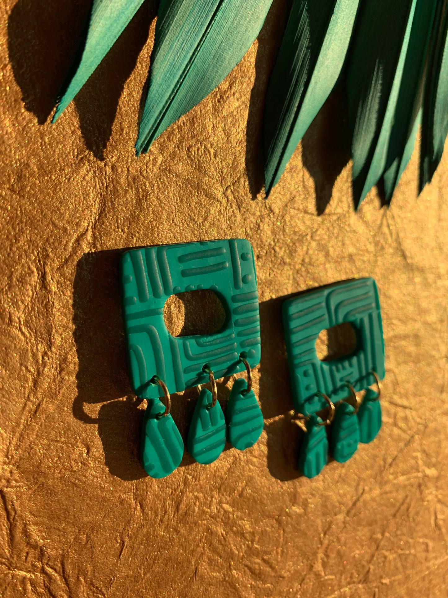 Pathways in Teal: Square Dangles