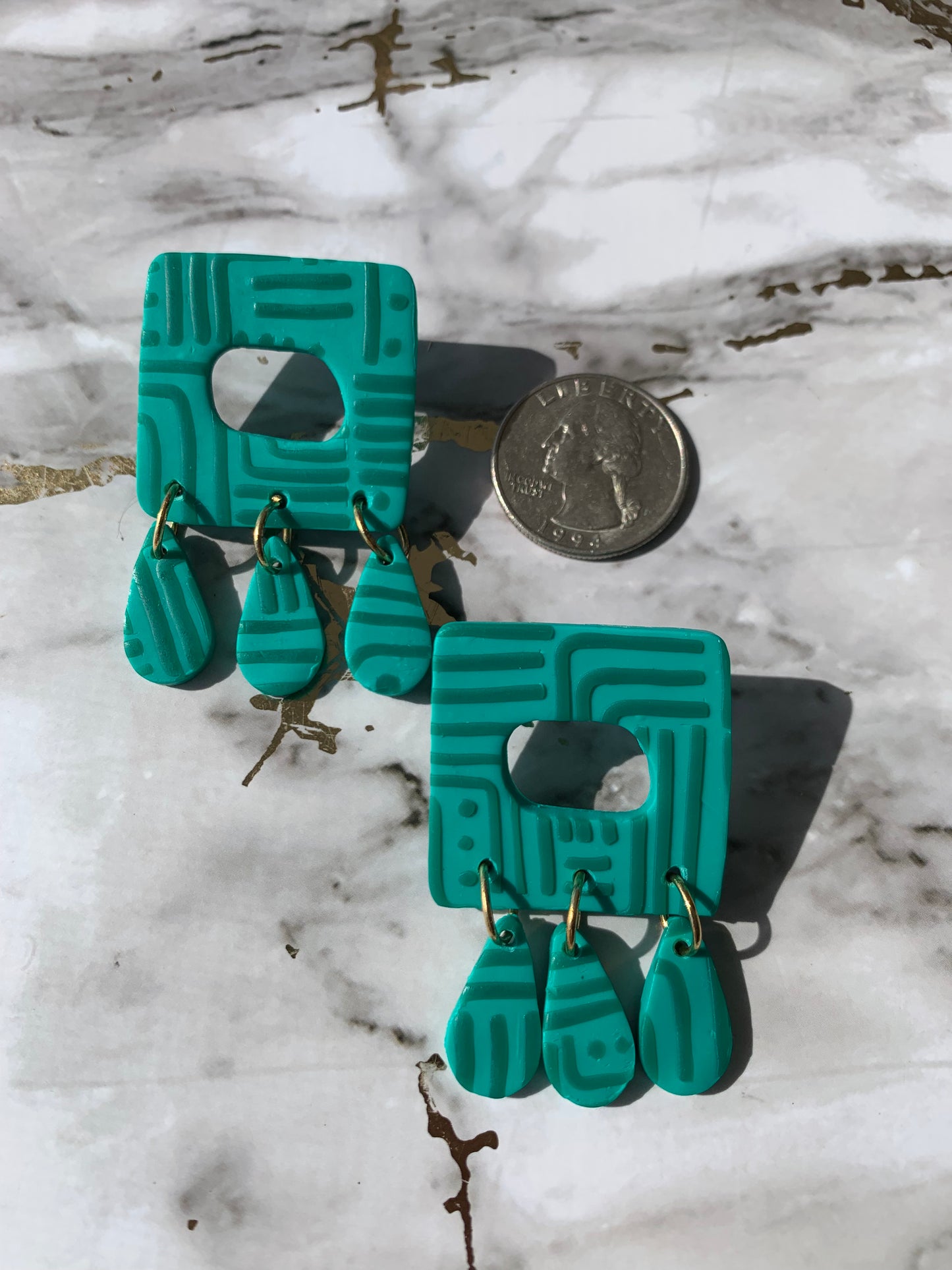 Pathways in Teal: Square Dangles