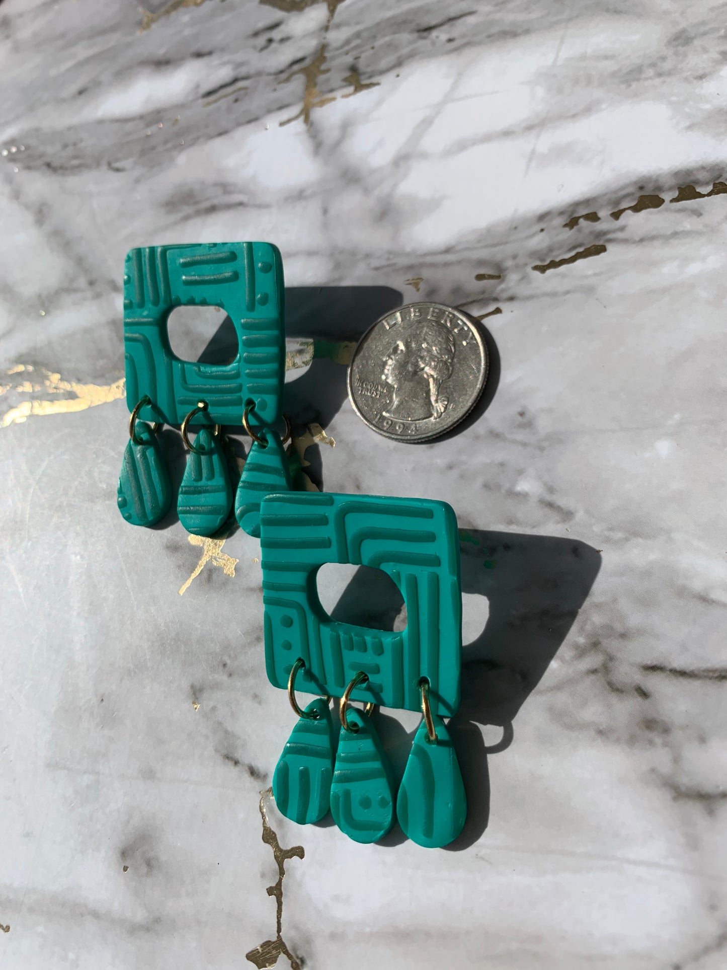 Pathways in Teal: Square Dangles